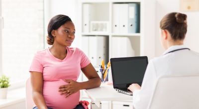 black pregnant woman in doctor's office